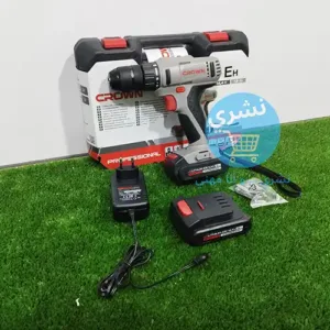 Visseuse Perceuse Sans fil 14,4v 1.5ah 2 Batteries Crown CT21055LM-1.5 BMC avec Logo Crown Original et valise sur fond vert vue de coté